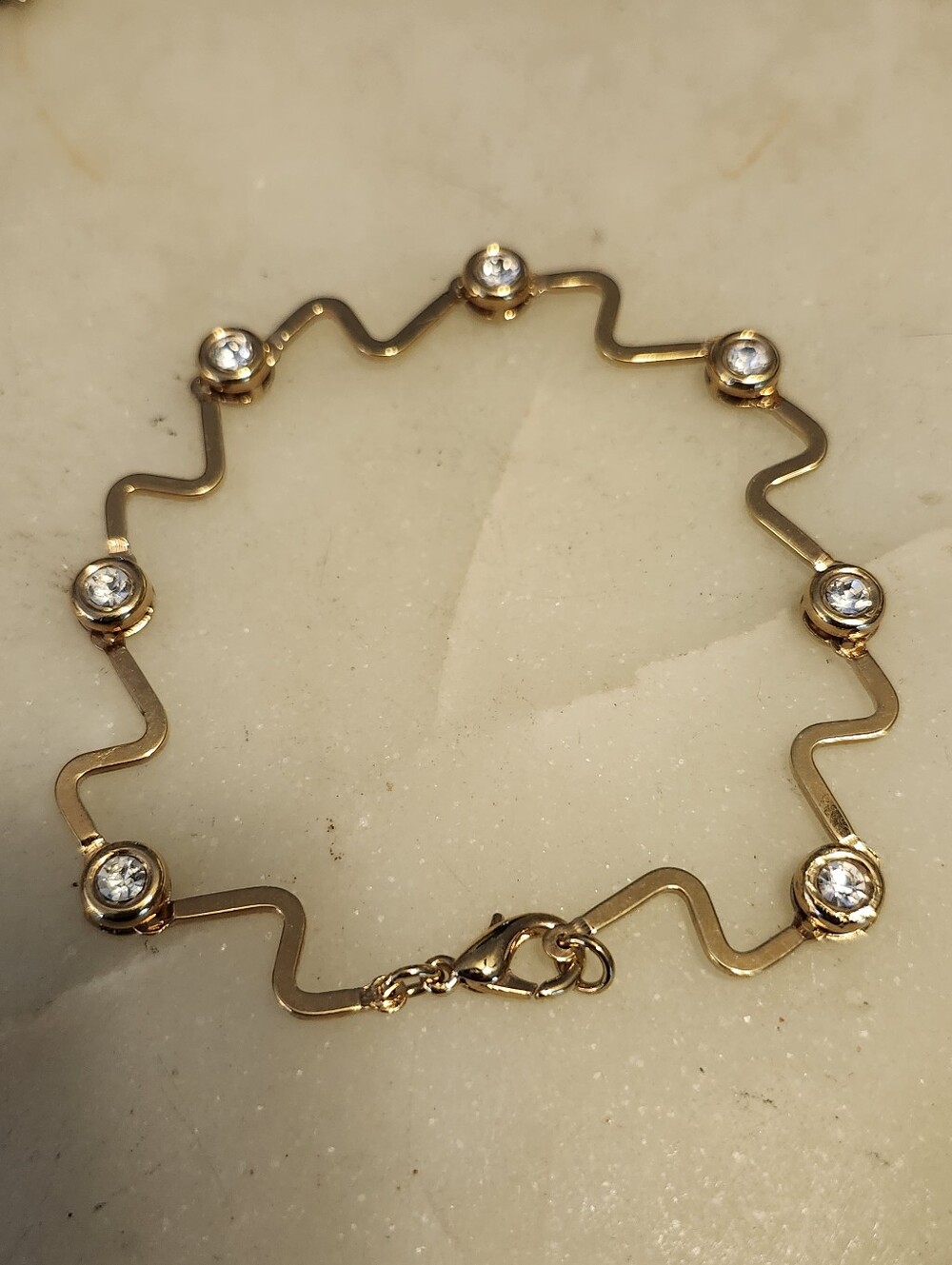Gold Tone Zigzag Bracelet with Clear Crystal Accents